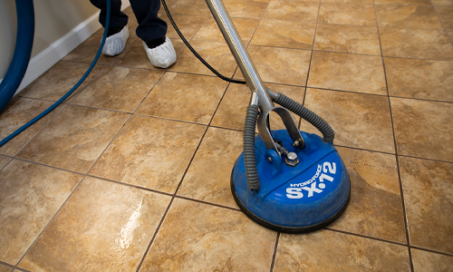 Cleaning ceramic tile flooring in commercial office