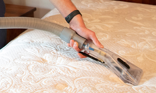 Cleaning mattress in a residential home