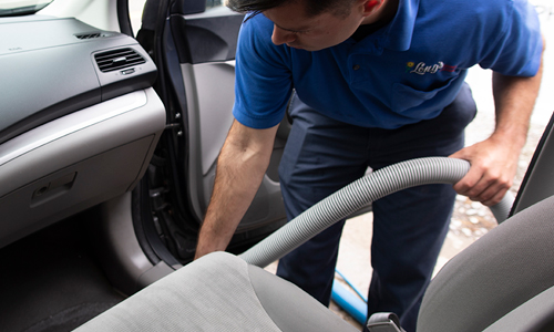 Vacuuming residential vehicle interior